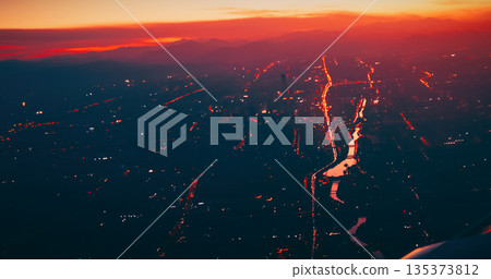 Beijing metropolitan area aerial view at dusk with glowing highways and city lights 135373812