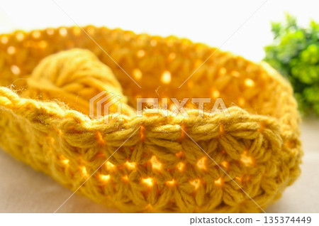 In the middle of making a patterned bag 135374449