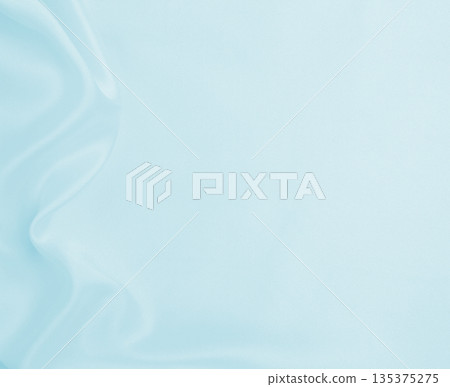 Smooth elegant blue silk or satin luxury cloth texture as abstract background. Luxurious background design 135375275