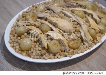 Moughrabieh is a popular dish in the Lebanese cuisine 135375321