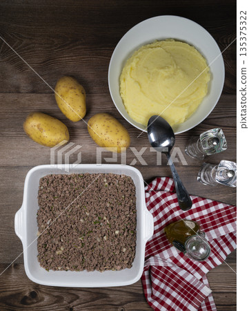 Hachis parmentier, french dish with mashed potato and minced beef 135375322