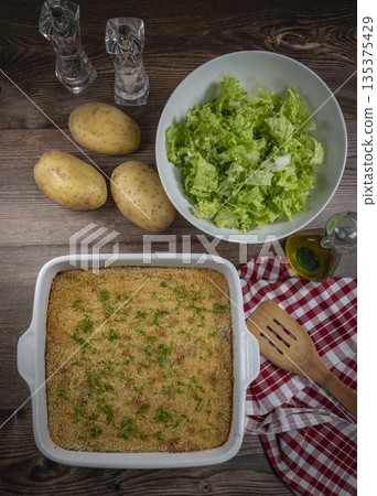 Hachis parmentier, french dish with mashed potato and minced beef 135375429