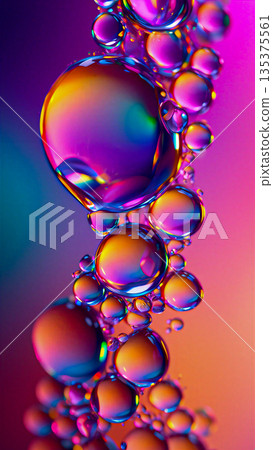 Vibrant iridescent water droplets reflecting a spectrum of colors. Water droplets on a surface reflect a spectrum of colors, creating a vivid display.  135375561
