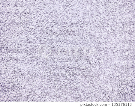 lavender fluffy texture closeup soft purple fabric surface gentle fibers serene mood abstract composition ideal for calming wallpaper or subtle banner background lavender fluffy texture closeup soft purple fabric surface gentle fibers serene mood abstract composition ideal for calming wallpaper or subtle banner background 135376113