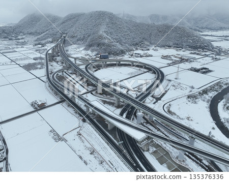 Drone aerial shot of the highway near the interchange in Gifu Drone aerial shot of the highway near the interchange in Gifu 135376336
