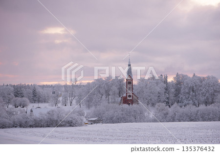 Snow Covered Church in Latvian Winter Landscape Snow Covered Church in Latvian Winter Landscape 135376432
