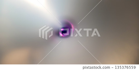 Abstract metallic swirl with purple glow. Abstract image featuring a metallic swirl with a smooth texture.  135376559