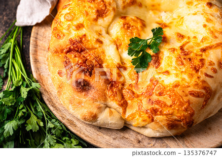 Khachapuri with cheese, Georgian cuisine Khachapuri with cheese, Georgian cuisine 135376747