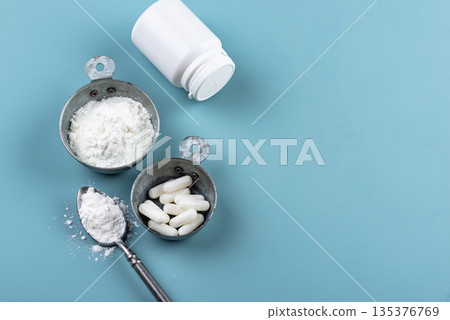 Collagen powder and pills. Healthy supplement Collagen powder and pills. Healthy supplement 135376769