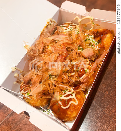 Hot takoyaki with mayonnaise and plenty of bonito flakes - Osaka street food 135377146