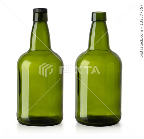 Green glass bottles with and without cap on transparent background 135377557
