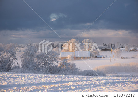 Snowy Countryside With Dark Blue Storm Sky Snowy Countryside With Dark Blue Storm Sky 135378218