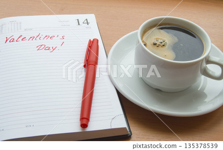 The concept of celebrating Valentine's Day, Cup coffee, diaries The concept of celebrating Valentine's Day, Cup coffee, diaries 135378539
