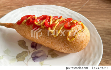 Corn dog with sauce 135379035