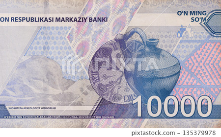 Ozbekiston Markaziy Banki recognized 10000 som denomination cash banknote used as official currency in Uzbekistan rear view 135379978
