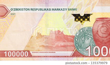 Uzbekistan issued 100000 som banknote cash functioning as official currency of Ozbekiston Respublikasi front view 135379979