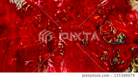Art texture. Ink mix. Bright red pigment spill on uneven shiny background. Acrylic color emulsion paint abstract defocused swirl flow. 135380079
