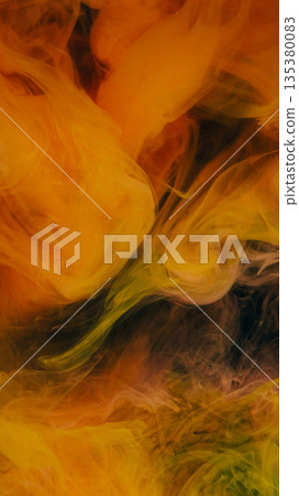 Chemical pigment. Steam floating. Defocused orange color paint water mist texture flowing on abstract art dark black wet background. Chemical pigment. Steam floating. Defocused orange color paint water mist texture flowing on abstract art dark black wet background. 135380083