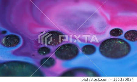 Ink stains. Oil droplet. Defocused pink blue colorful sparkling water marble wet round liquid on abstract art chemical background. Ink stains. Oil droplet. Defocused pink blue colorful sparkling water marble wet round liquid on abstract art chemical background. 135380084