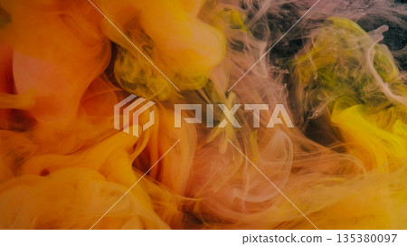 Mix color. Flowing paint. Blur yellow pink smoke ethereal vapor water wave chemical liquid floating on abstract dark black acrylic background. Mix color. Flowing paint. Blur yellow pink smoke ethereal vapor water wave chemical liquid floating on abstract dark black acrylic background. 135380097