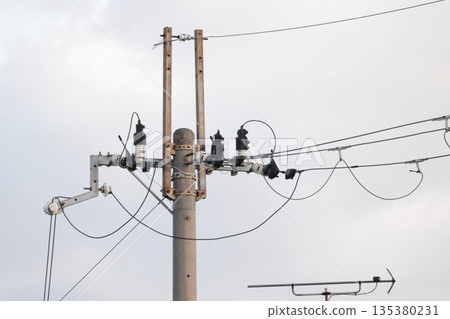 Photo of the top of the telephone pole and antenna 135380231