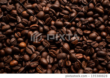 Background of coffee beans. Roasted coffee beans. 135380828