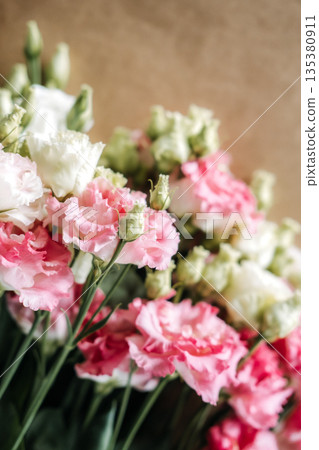 Large bouquet of cream and pale pink roses with soft petals fills frame in gentle light. Florist education, DIY botanical workshop, flower arranging class. Large bouquet of cream and pale pink roses with soft petals fills frame in gentle light. Florist education, DIY botanical workshop, flower arranging class. 135380911