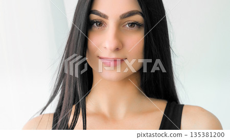 Healthy complexion. Facial wellness. Charming smiling female with long hair. Attractive girl visage health skin isolated on white. Healthy complexion. Facial wellness. Charming smiling female with long hair. Attractive girl visage health skin isolated on white. 135381200