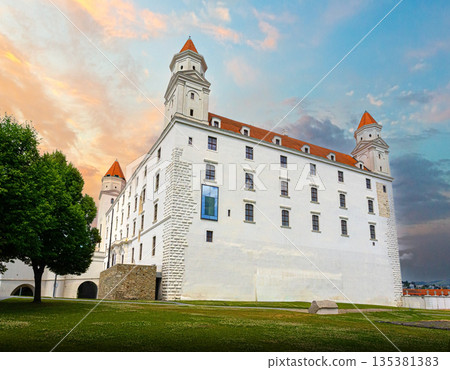 Bratislava castle at sunset with colorful sky Bratislava castle at sunset with colorful sky 135381383