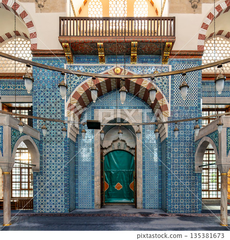 Rustem Pasha Mosque interior with intricate blue Iznik tiles, mihrab, and historic Ottoman architecture, Istanbul, Turkey. Rustem Pasha Mosque interior with intricate blue Iznik tiles, mihrab, and historic Ottoman architecture, Istanbul, Turkey. 135381673
