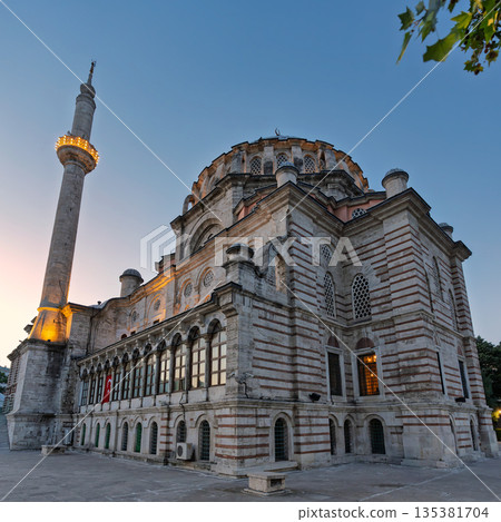 Historic Laleli Mosque, also known as Laleli Camii, illuminated at twilight in Istanbul, Turkey. Historic Laleli Mosque, also known as Laleli Camii, illuminated at twilight in Istanbul, Turkey. 135381704