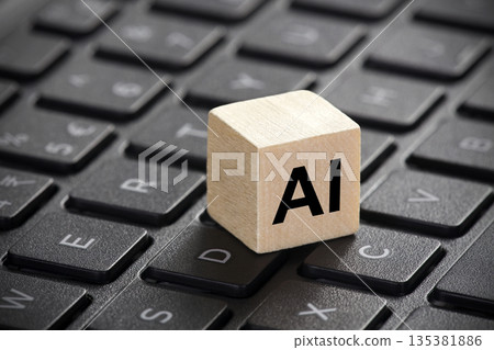 Wooden block with artificial intelligence symbol on computer keyboard Wooden block with artificial intelligence symbol on computer keyboard 135381886