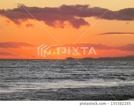 Sunset sky and calm seascape 135382285
