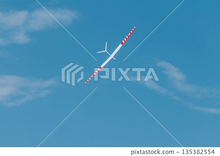 RC soaring plane on blue sky 135382554