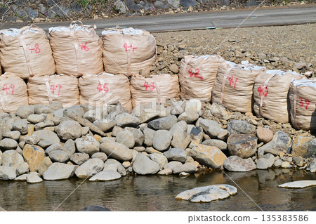 Disaster image (flood damage, heavy rain disaster, restoration, river construction, bank protection construction) 135383586