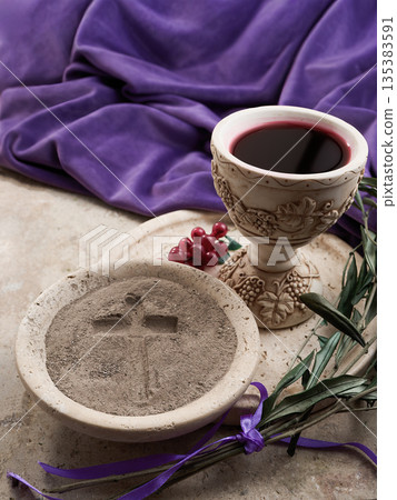 Ash wednesday symbols with chalice, wine, and ashes 135383591