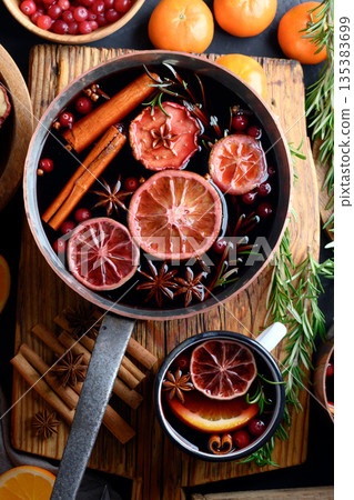 Top view of copper pot with red mulled wine 135383699