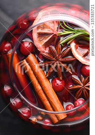 Top view of red mulled wine glass with slices of orange Top view of red mulled wine glass with slices of orange 135383721