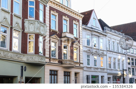 Old town apartment building for housing investment. 135384326