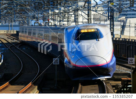 Heading for Mutsu... "E2 Series" Shinkansen train entering Omiya Station on the Tohoku Shinkansen Line 135385207