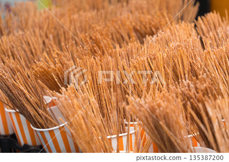 Fried pasta sold at a food stall 135387200