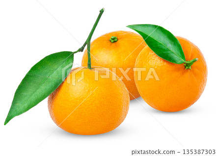 Organic tangerine or clementine with green leaf isolated. Mandarins with green leaves. 135387303