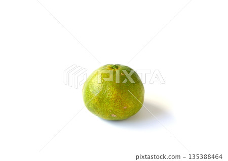 Imperfect green mandarin oranges on white background Imperfect green mandarin oranges on white background 135388464