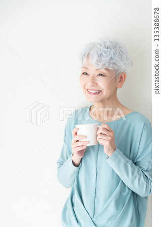 senior woman with mug senior woman with mug 135388678
