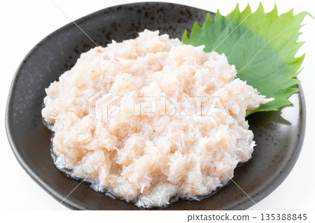 Close-up of boiled snow crab (flaked meat) served on a plate Close-up of boiled snow crab (flaked meat) served on a plate 135388845