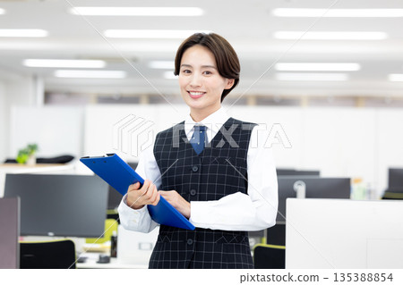 Portrait of a woman in a business uniform 135388854