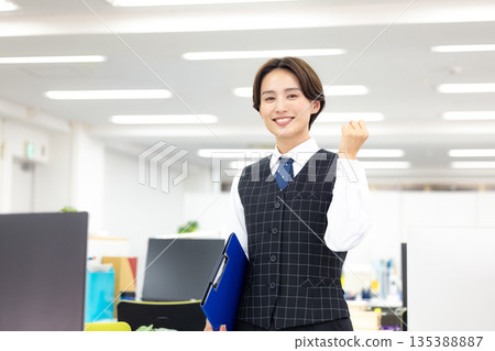 Portrait of a woman in a business uniform Portrait of a woman in a business uniform 135388887