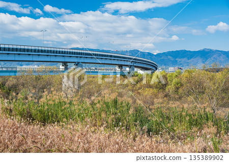 Winter scenery of the Katsura River, Utsukushibashi Bridge, Kyoto City 135389902