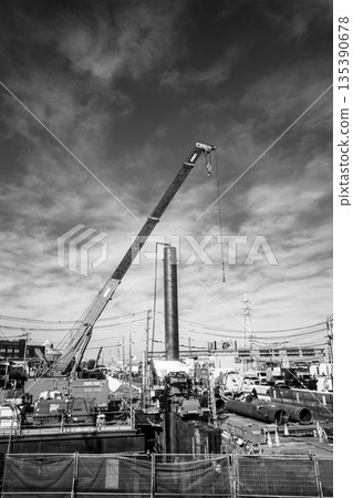 Bridge replacement work on the Shingashi River in Kawagoe City, December 2025. Vertical, monochrome 135390678