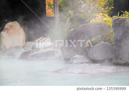 Unzen Onsen: An open-air bath with milky white spring water flowing directly from the source Unzen Onsen: An open-air bath with milky white spring water flowing directly from the source 135390999